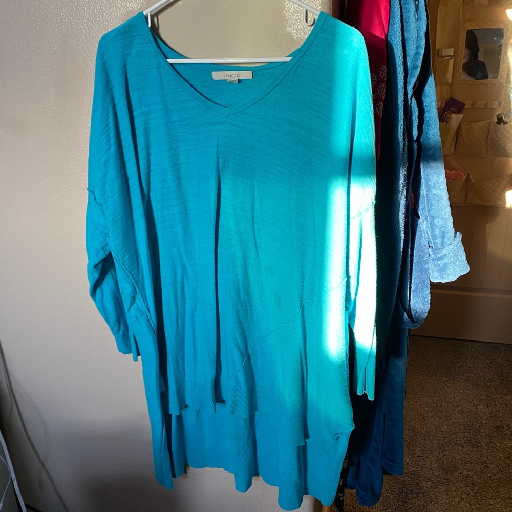 long sleeved blue/aqua long shirt